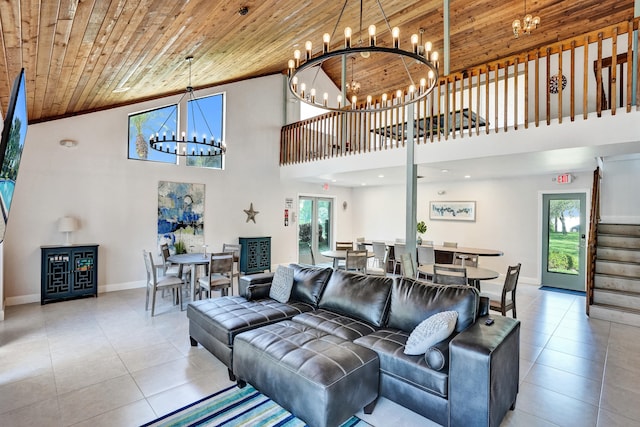 living room with wood ceiling, high vaulted ceiling, and a healthy amount of sunlight