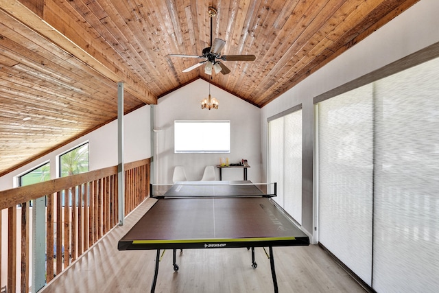 rec room with lofted ceiling, ceiling fan with notable chandelier, wood ceiling, and light hardwood / wood-style flooring