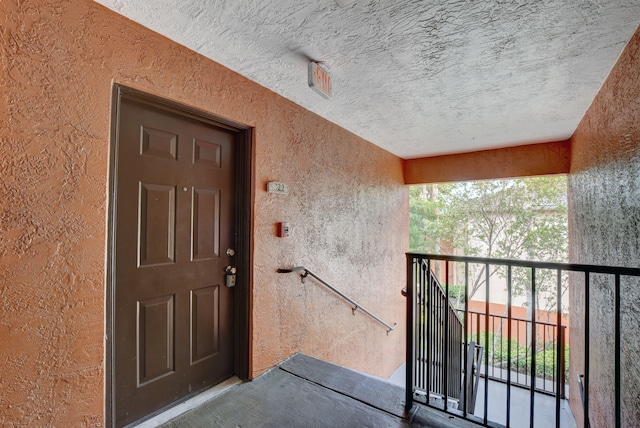 doorway to property with a balcony