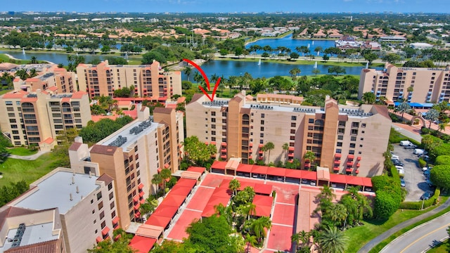 birds eye view of property featuring a water view