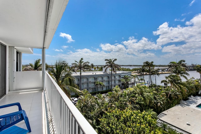 balcony featuring a water view