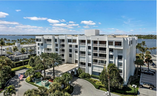 view of property with a water view