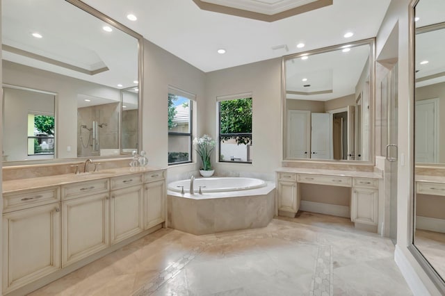 bathroom with separate shower and tub, a raised ceiling, vanity, and crown molding