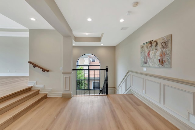 entrance foyer with light hardwood / wood-style flooring