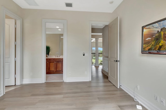 hall featuring light hardwood / wood-style flooring