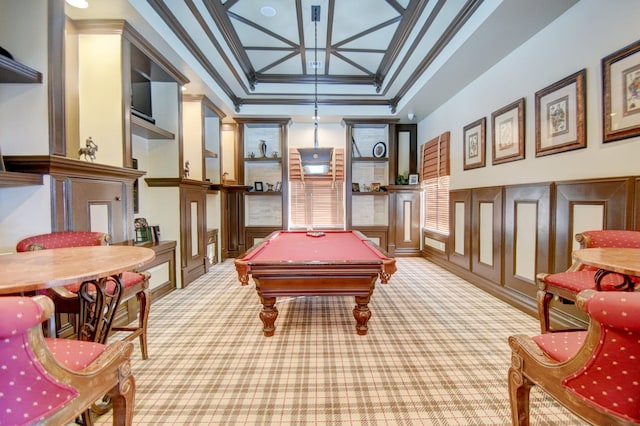 game room with pool table, light colored carpet, a raised ceiling, and crown molding