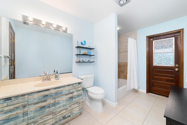 full bathroom featuring tile patterned flooring, vanity, toilet, shower / bath combination with curtain, and baseboards