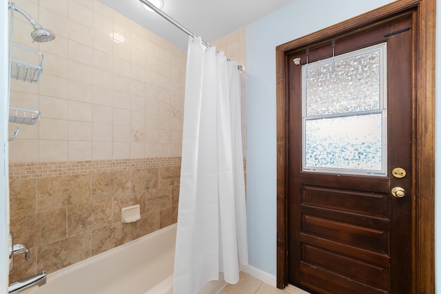 bathroom featuring tile patterned floors and shower / tub combo