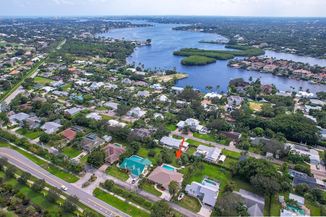 drone / aerial view with a water view