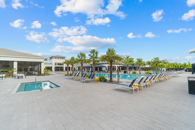 view of swimming pool featuring a patio area