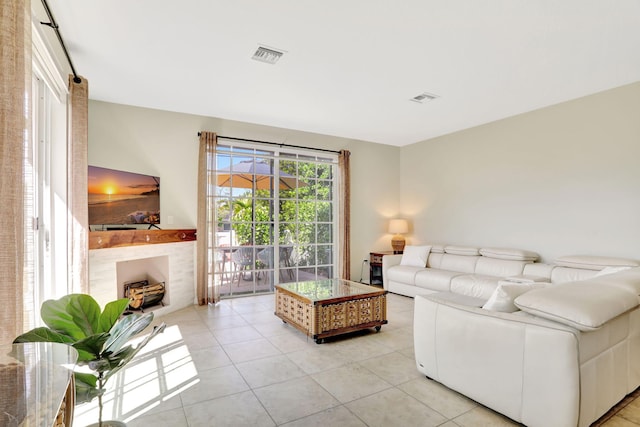 living room with light tile patterned floors