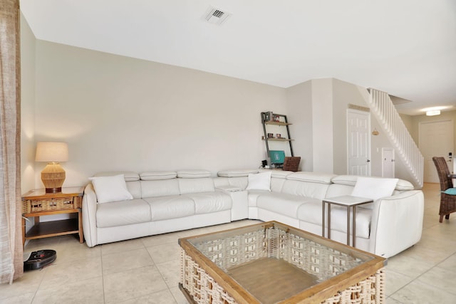 living room featuring light tile patterned flooring