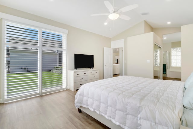 bedroom featuring light hardwood / wood-style flooring, lofted ceiling, and ceiling fan