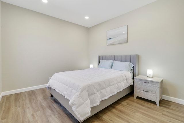 bedroom featuring light hardwood / wood-style floors