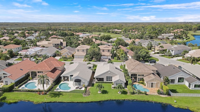 bird's eye view with a water view