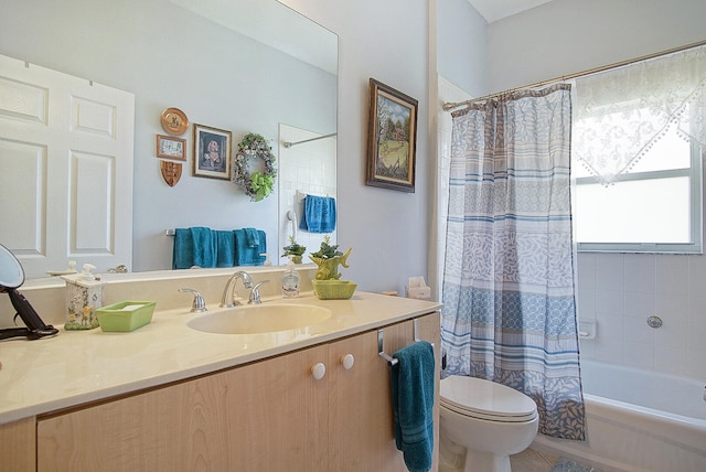 full bathroom with shower / bathtub combination with curtain, tile patterned floors, vanity, and toilet