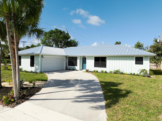 single story home with a front lawn and a garage