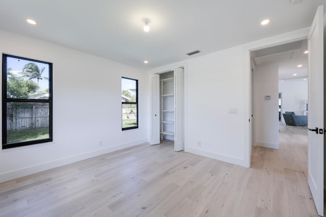 unfurnished bedroom with light hardwood / wood-style flooring