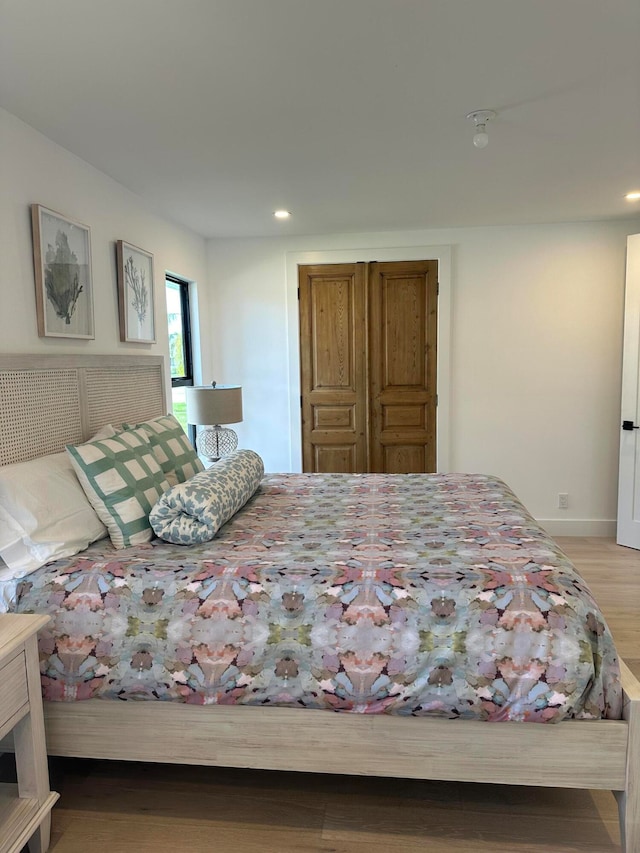 bedroom featuring light wood-type flooring