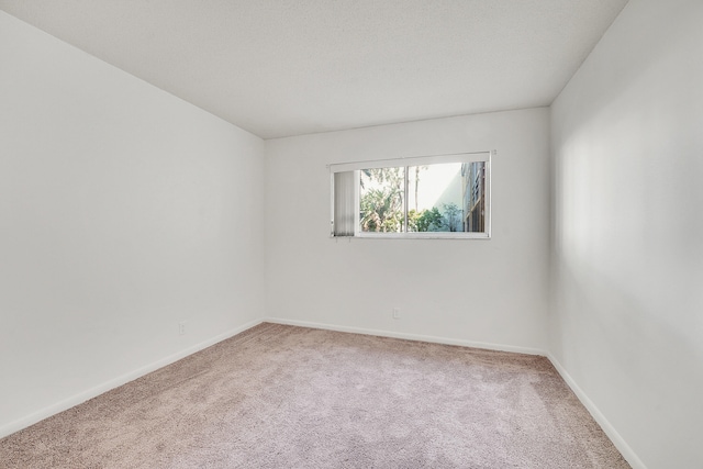 empty room with carpet floors