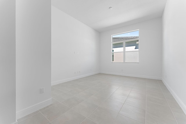 view of tiled spare room