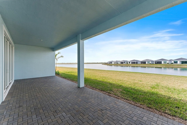 view of patio / terrace featuring a water view