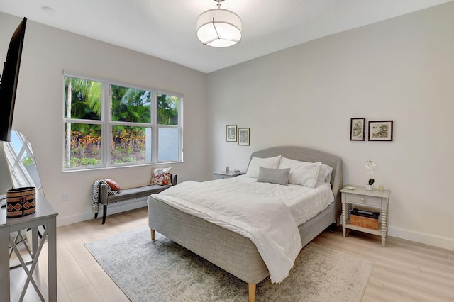 bedroom featuring light wood-type flooring