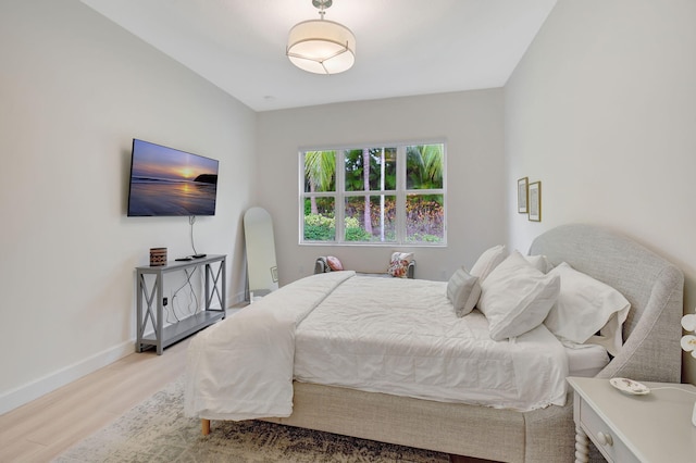 bedroom featuring hardwood / wood-style floors