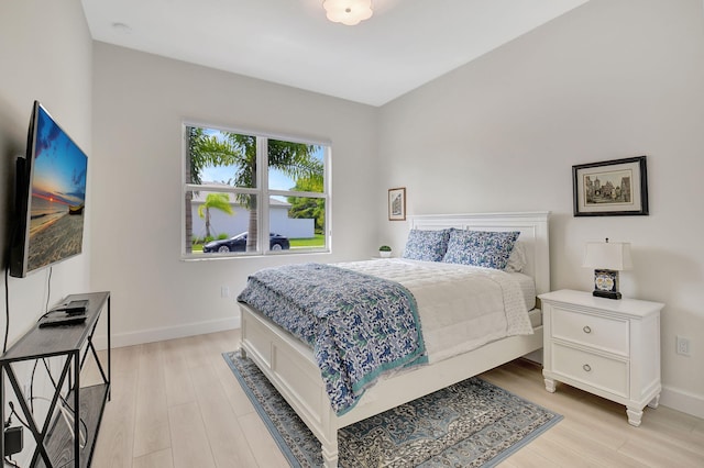 bedroom with light hardwood / wood-style floors