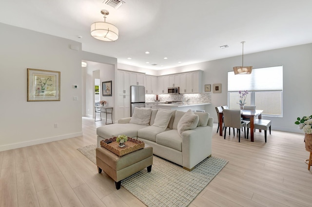 living room with light wood-type flooring