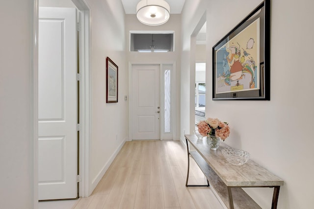 foyer with light hardwood / wood-style floors