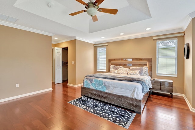 bedroom featuring multiple windows, ceiling fan, and dark wood-type flooring