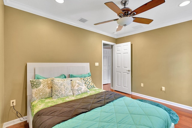 bedroom featuring crown molding, ceiling fan, and wood-type flooring