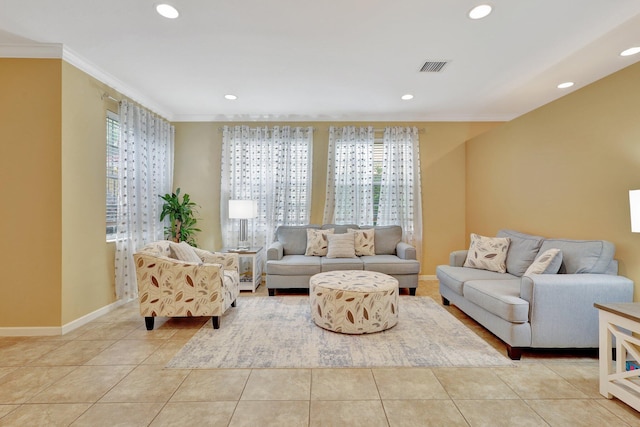 tiled living room featuring crown molding