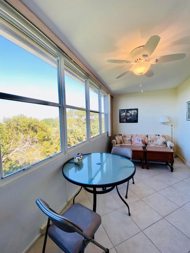 sunroom / solarium with ceiling fan