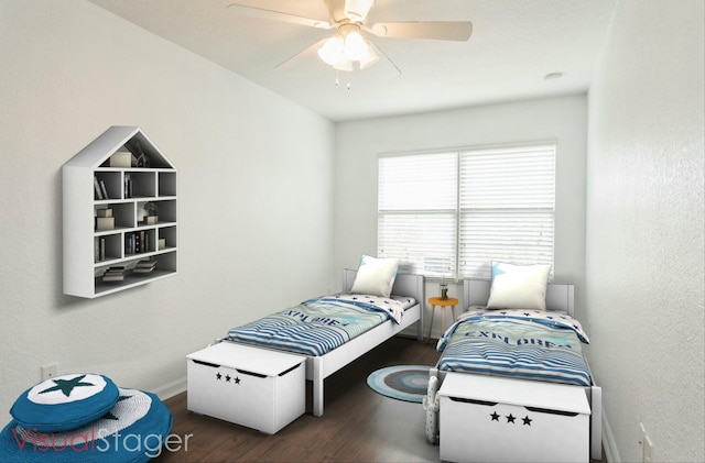 bedroom featuring wood finished floors, baseboards, and ceiling fan