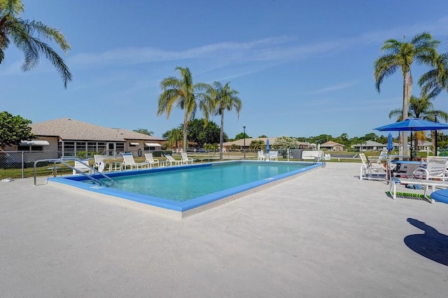 view of pool featuring a patio