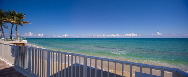 view of water feature with a beach view