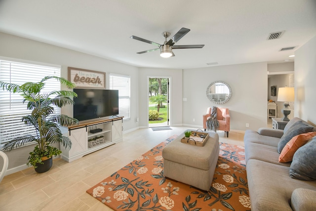 living room with ceiling fan