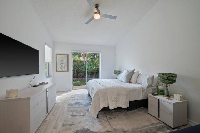 4561 Carlton Golf Dr, Lake Worth, FL 33449 - bedroom featuring a ceiling fan, vaulted ceiling, light wood-style flooring, and access to exterior