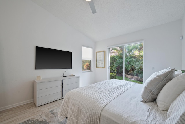 4561 Carlton Golf Dr, Lake Worth, FL 33449 - bedroom with a ceiling fan, light wood finished floors, baseboards, lofted ceiling, and access to exterior
