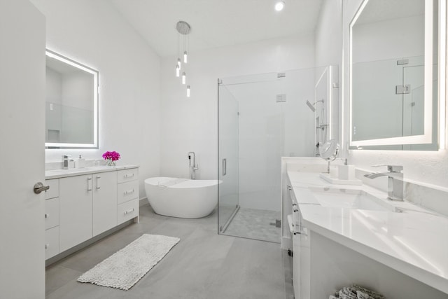 4561 Carlton Golf Dr, Lake Worth, FL 33449 - full bathroom with a shower stall, two vanities, a soaking tub, and a sink