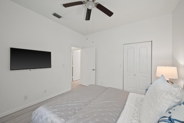 4561 Carlton Golf Dr, Lake Worth, FL 33449 - bedroom with wood finished floors, a closet, ceiling fan, baseboards, and visible vents