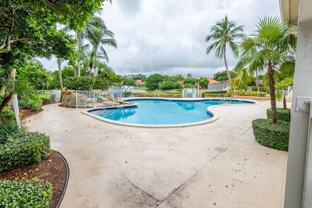 view of pool featuring a patio area