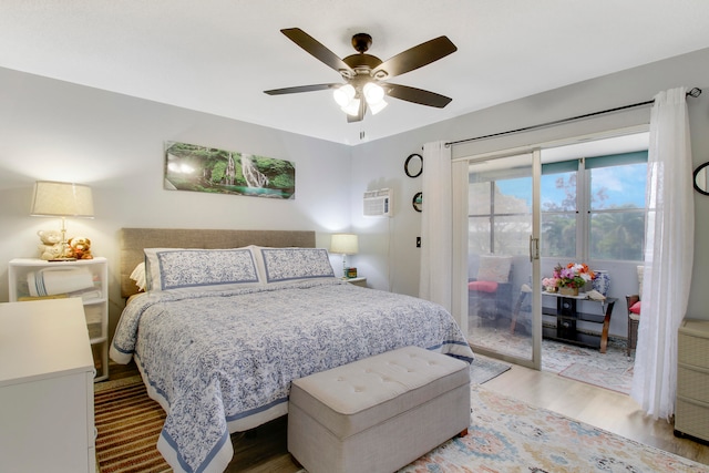 bedroom with access to outside, light hardwood / wood-style flooring, and ceiling fan