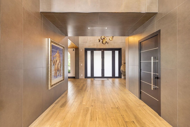 hallway featuring light hardwood / wood-style flooring