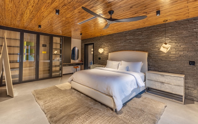 bedroom with ceiling fan and wooden ceiling