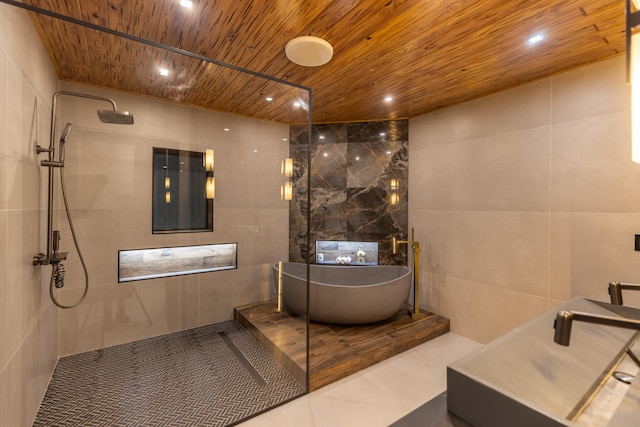 bathroom with shower with separate bathtub, sink, tile walls, and wood ceiling