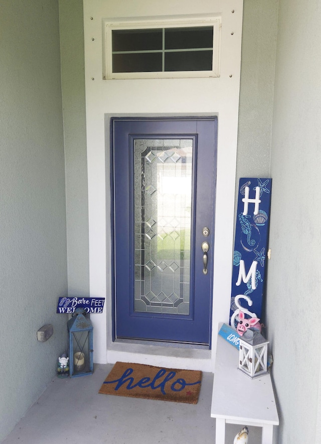 1892 SW Altman Ave, Port Saint Lucie, FL 34953 - entrance to property featuring stucco siding