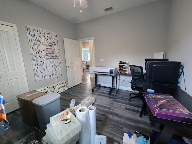 office space featuring ceiling fan and dark hardwood / wood-style floors